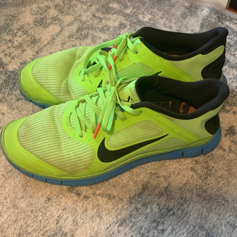 Nike Men’s Neon Green Athletic Shoes with Black Swoosh and Blue Sole
